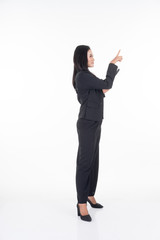 An attractive woman wearing business attire holding a tablet with various poses isolated on white background. Suitable for image cut out and manipulation works for technology,business or finance theme