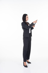 An attractive woman wearing business attire holding a tablet with various poses isolated on white background. Suitable for image cut out and manipulation works for technology,business or finance theme