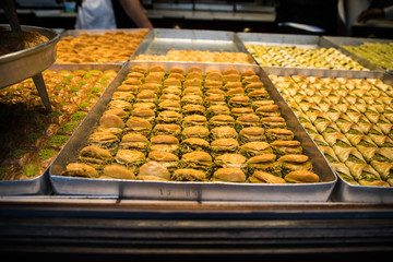 Istambul, Turkey - October, 2019: Traditional turkish dessert sweets assorted. Street food.