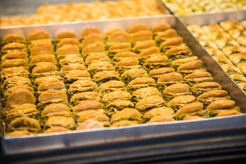Istambul, Turkey - October, 2019: Traditional turkish dessert sweets assorted. Street food.