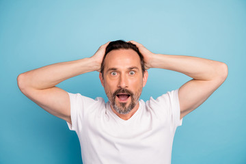 Fototapeta na wymiar Close-up portrait of his he nice attractive overwhelmed shocked guy freelancer great cool news facial expression isolated on bright vivid shine vibrant teal green blue turquoise color background