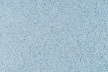 Blue metal texture with old paint cracks, abstract background