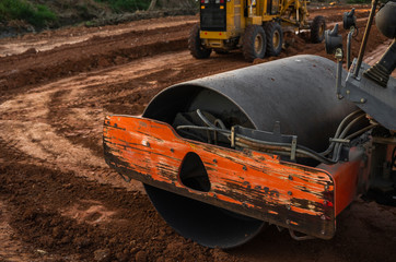 Road rollers working on the new roads construction site. Heavy duty machinery working on highway....
