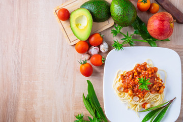 Pasta spaghetti with meatballs and ketchup on the table