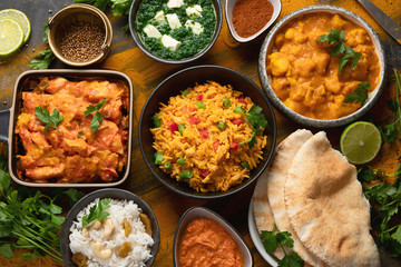 Assorted indian food on black background..