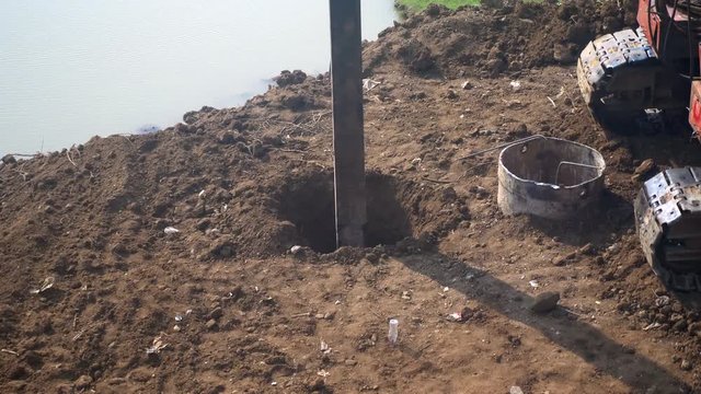 Bore pile rig machine operate at the  site. The machine used to driven pile for building foundation bridge.