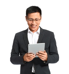 Fototapeta na wymiar Portrait of Asian businessman with tablet computer on white background