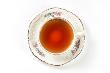 Cup of tea on a white background, closeup top view