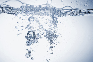 Fototapeta na wymiar Water splashes with bubbles.
