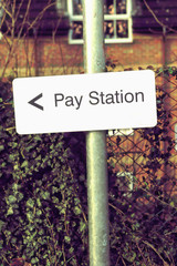 Pay station sign