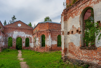 Ruined Lutheran church in Lahdenpohja, Karelia, Russia. Destroyed protestant temple in summer day. Architectural landmark in northern Russian town with Finnish heritage. Background for history theme