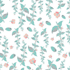 Seamless pattern of bright flowers and leaves on a white background.