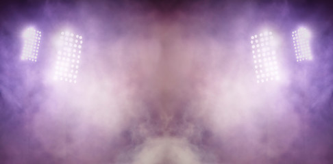 stadium lights and smoke against dark night sky background © ververidis