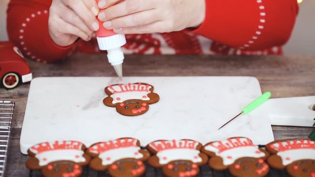 Step by step. Decorating gingerbread cookies with royal icing.