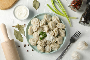 Composition with tasty dumplings on white background, top view