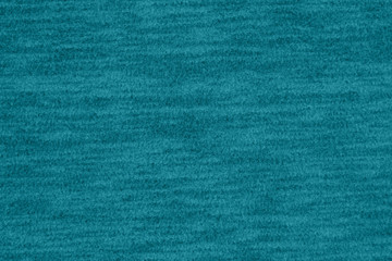Teal and black fleece textured plush fabric material background