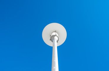 Isolated halogen street lamps. Outdoor lighting street pole. Minimal industrial design and detail. 