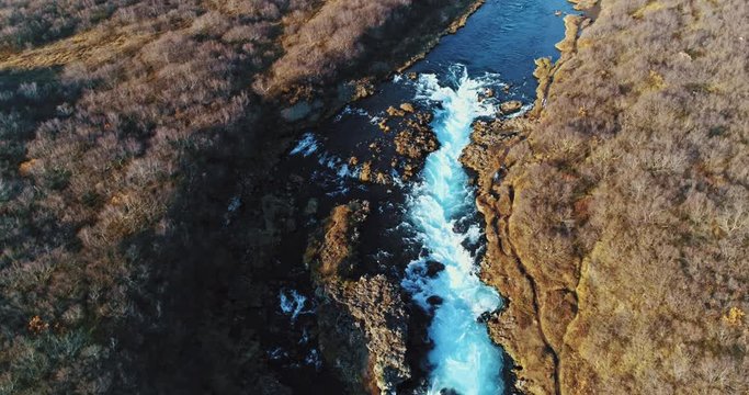 aerial shot of famous Iceland with its beautiful fascinating unique landscape, rivers, mountains, glaciers and waterfalls on a clear sunny day - great 4k shots for nature travel bloggers