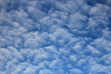 unusual picturesque clouds in the blue sky