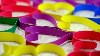  Colored paper hearts. Abstract background for greeting cards and posters.