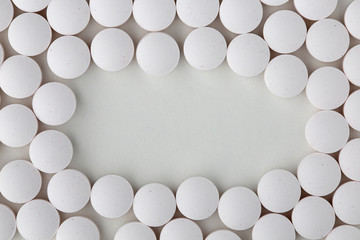 Pills tablets vitamins capsules drugs white close up macro shot