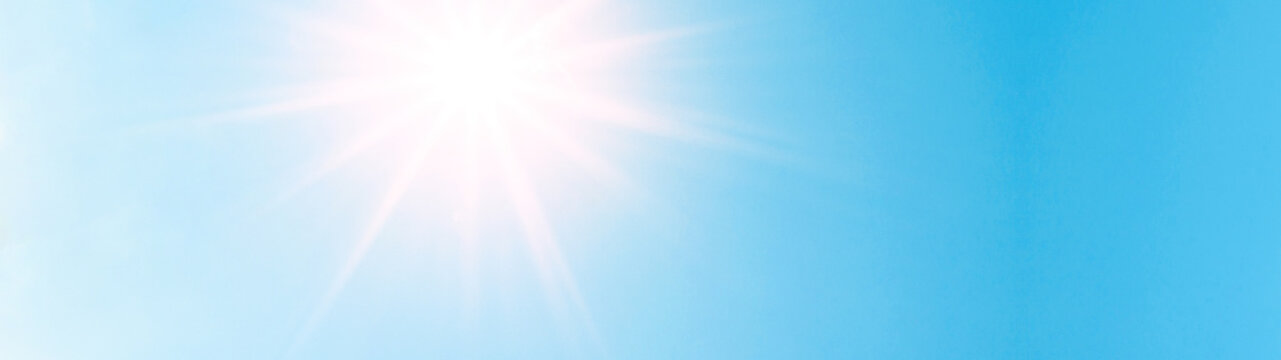 Blue sky with sunshine background panorama banner