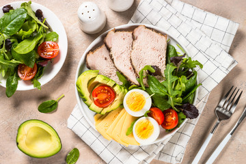 Keto diet plate on white table.