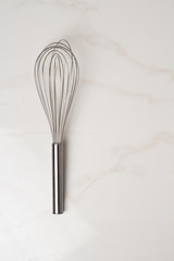 culinary whisk on a white background