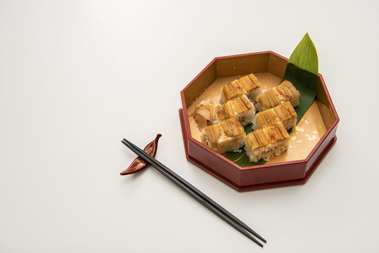 Japanese unagi sushi, Eel sushi in Japanese bowl on white background with copy space.  