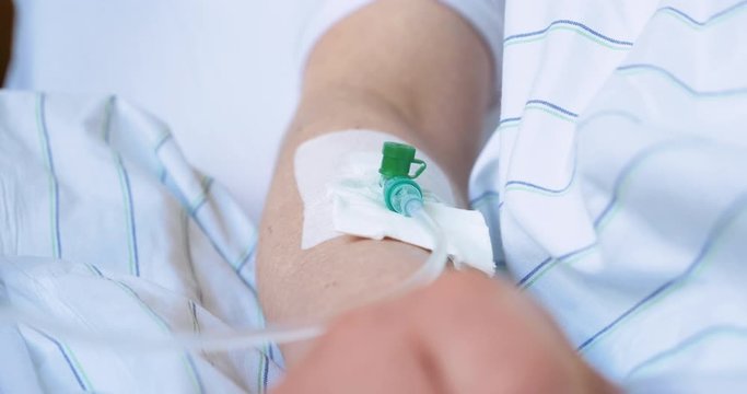 IV Fluid Tube in Hospital Patient's Arm