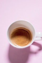Fresh cup espresso coffee with milk. Food background