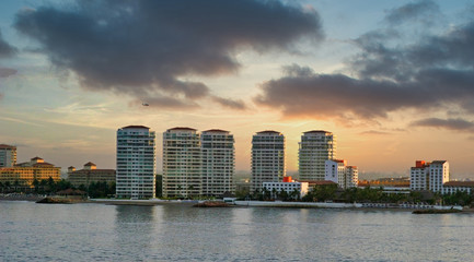 Rows of high rise coastal condos in dawn sun