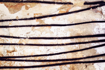 Old wall with peeling paint. Rough vintage background	