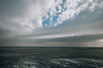 frozen water blue-green ice on the river. winter landscape with a pond.
