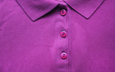 Violet colorful polo shirt with buttoned collar neck. Stylish modern clothing, dark purple colour...
