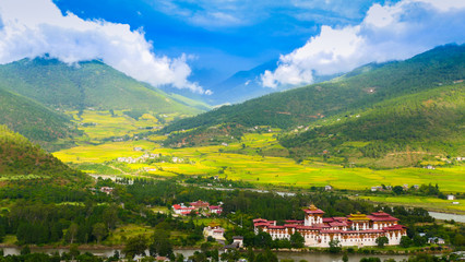 A large view over the amazing mountain valley and the monastery 'Punakha-Dzong' in the Kingdom of Bhutan in Punakha