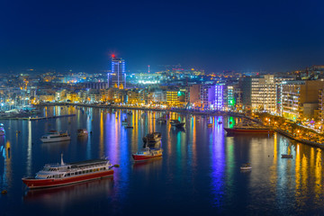 Fototapeta na wymiar Night scenery of Sliema harbor on Malta.