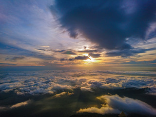 Beautiful Sunrise Sky with Sea of the mist of fog in the morning on Khao Luang mountain in Ramkhamhaeng National Park,Sukhothai province Thailand