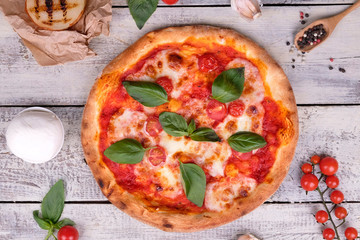 pizza with tomatoes and olives