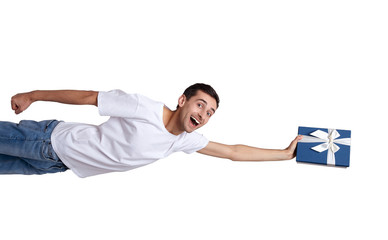 Screaming with joy white man with a gift box of blue in his hands.