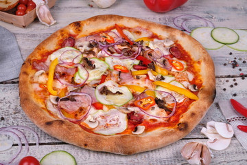pizza with tomatoes and pepper