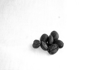 coffee beans on linen fabric black and white photo