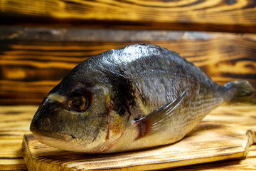darado fish on a wooden table