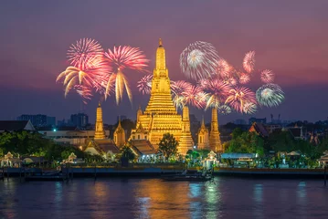 Foto op Plexiglas firework thai festival night at Thai temple named "Wat Arun" Buddhist Temple, a beautiful famous pagoda place. tourists and tour guides from around the world to visit. Bangkok city, Thailand, Asia.  © anuchit2012