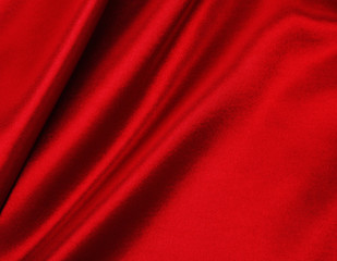 Smooth elegant red silk or satin luxury cloth texture as abstract background. Luxurious valentines...