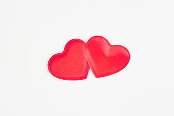 Two red hearts isolated on white background ,copy space available