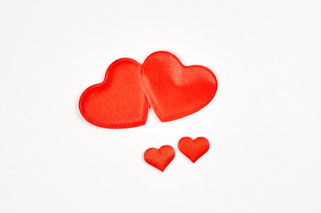 Two red hearts isolated on white background ,copy space available