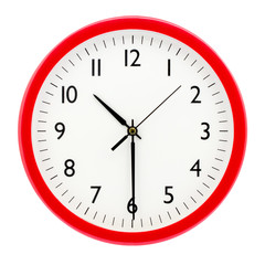 Clock with red round frame on white isolated background shows 10(22) hours 30 minutes_