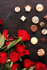 Flowers composition. Frame made of rose flowers, confetti. Valentine's Day background.