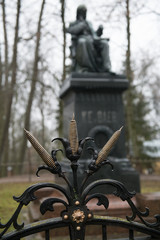 Ornate wrought-iron decorations on gate to statue of Karl Ernst von Baer, Tartu, Estonia